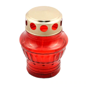 Red glass candle with golden cap